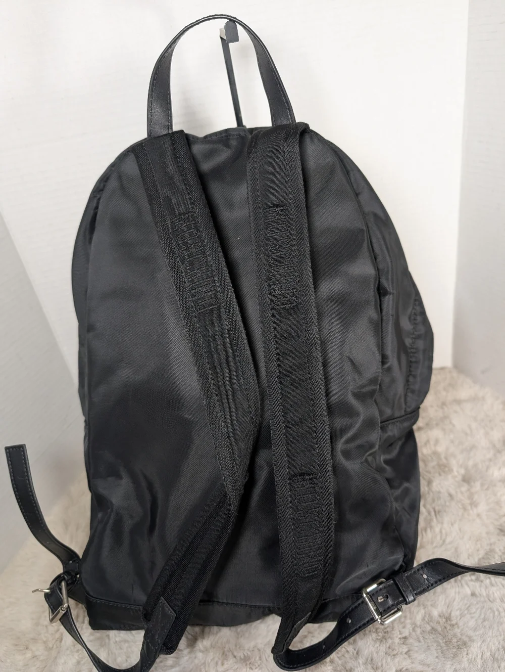 Moschino Interlocking clamp print backpack